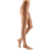 Beige medical compression tights for leg support, shown on model against white background