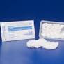 Sterile gauze pads in tray and packaging for medical wound care on blue background.