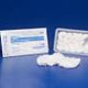 Sterile gauze pads in tray and packaging for medical wound care on blue background.