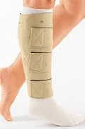 Compression leg wrap with adjustable straps on lower leg for medical support
