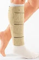 Compression leg wrap with adjustable straps on lower leg for medical support