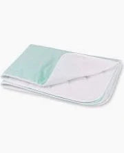 Waterproof reusable bed pad for incontinence and medical needs, folded on white background.