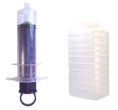 Large medical syringe and clear fluid container for home medical supplies
