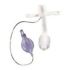 Medical tracheostomy tube with cuff and inflation bulb on white background