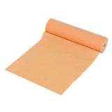 Rolled beige medical practice bandage or exercise therapy resistance band on white background