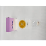 ostomy bag kit with adhesive barrier, transparent pouch, and purple product box on white background
