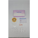 Ostomy care kit with adhesive barrier, stoma measuring card, instructions, and accessories