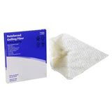 Reinforced gelling fiber wound dressing next to product box for medical supplies
