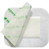 Adhesive sterile medical dressing with part of the protective film peeled back