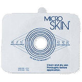 Microskin ostomy barrier with circular cut-to-fit guide for stoma care and adhesive application