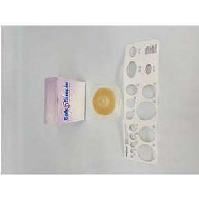 Ostomy barrier ring with sample box and stoma measuring guide on white background