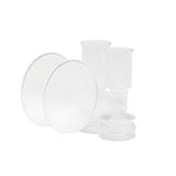 Clear plastic breast pump parts kit for home medical supplies on white background