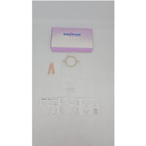 Ostomy care kit with barrier ring, stoma measuring guide, and medical supplies on white background