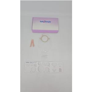 Ostomy care kit with barrier ring, stoma measuring guide, and medical supplies on white background