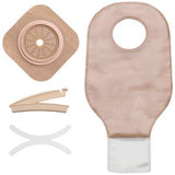 Ostomy pouch kit with beige drainable bag, barrier ring, and closure accessories
