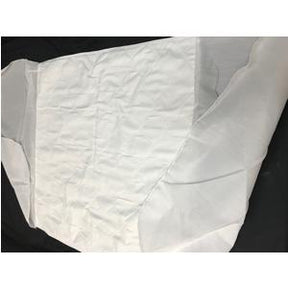 Disposable white medical bed sheet on black surface, home healthcare supply