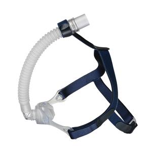 Nasal CPAP mask with adjustable blue headgear and flexible hose for sleep apnea therapy
