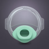 Clear silicone breast pump spout and valve with mint green center on gray background