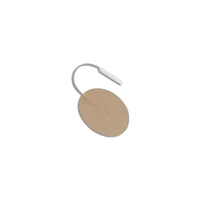 Oval beige medical electrode pad with attached lead wire on white background