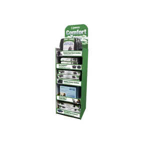 Green retail display stand with seat cushions, back supports, and comfort zone signage.