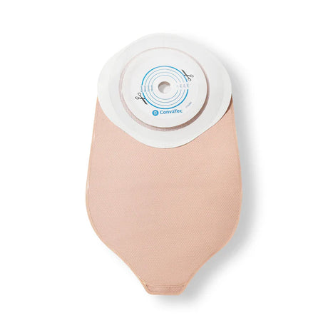 Cut-to-fit urostomy pouch with circular barrier and beige material, Accuseal tap visible