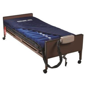 Hospital bed with blue alternating pressure mattress and electric pump for home care