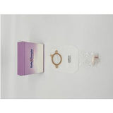 Ostomy bag with adhesive ring and medical packaging on white background