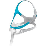 Full face CPAP mask with blue and gray headgear for sleep apnea therapy