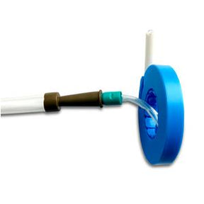 Medical feeding tube with blue coiled dispenser and connector for home care use
