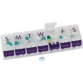 Weekly pill organizer with labeled compartments and assorted daily medication