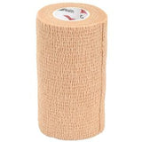 Beige self-adhesive medical bandage roll for wound care and support, isolated on white