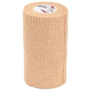 Beige self-adhesive medical bandage roll for wound care and support, isolated on white