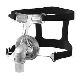 Clear CPAP nasal mask with adjustable black headgear for sleep apnea therapy