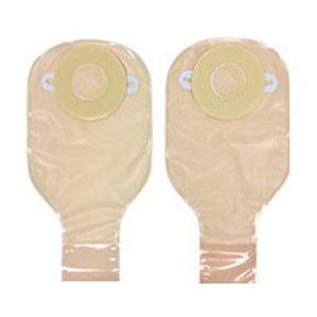 Two beige ostomy bags with circular adhesive flanges for medical use, side by side