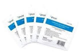 Sterile adhesive wound dressing pads in white packaging, five packs fanned out