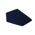 Contoured dark blue foam wedge pillow for medical support on white background