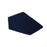 Contoured dark blue foam wedge pillow for medical support on white background