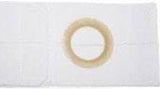 Medical ostomy barrier pad with central adhesive ring on white background