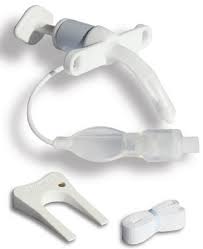 Tracheostomy tube kit with tube, strap, and cleaning tool for respiratory care