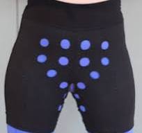 Compression shorts with blue circular patterns for therapeutic support
