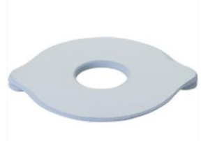 Foam ostomy barrier ring with central hole, medical ostomy accessory on white background