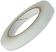 Clear medical adhesive tape roll for securing bandages and dressings