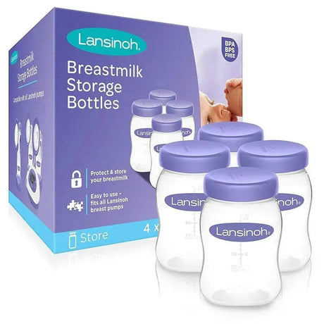 Set of four clear breastmilk storage bottles with purple lids and product packaging