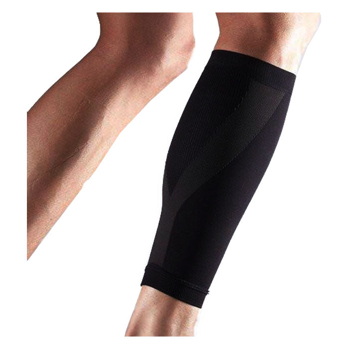 Black calf compression sleeve worn on lower leg for muscle support and circulation