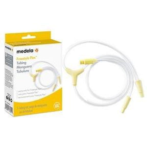 Medela Freestyle Flex breast pump tubing with yellow connectors next to product box