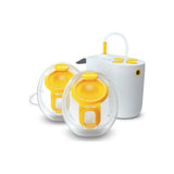 Electric breast pump with two yellow and white milk collection cups on white background