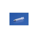Disposable medical syringe with clear barrel and measurement markings on blue background