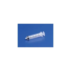 Disposable medical syringe with clear barrel and measurement markings on blue background