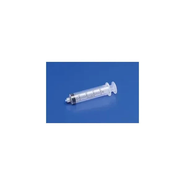 Disposable medical syringe with clear barrel and measurement markings on blue background