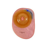 One-piece ostomy pouch with adhesive barrier on white background, medical supply for stoma care.